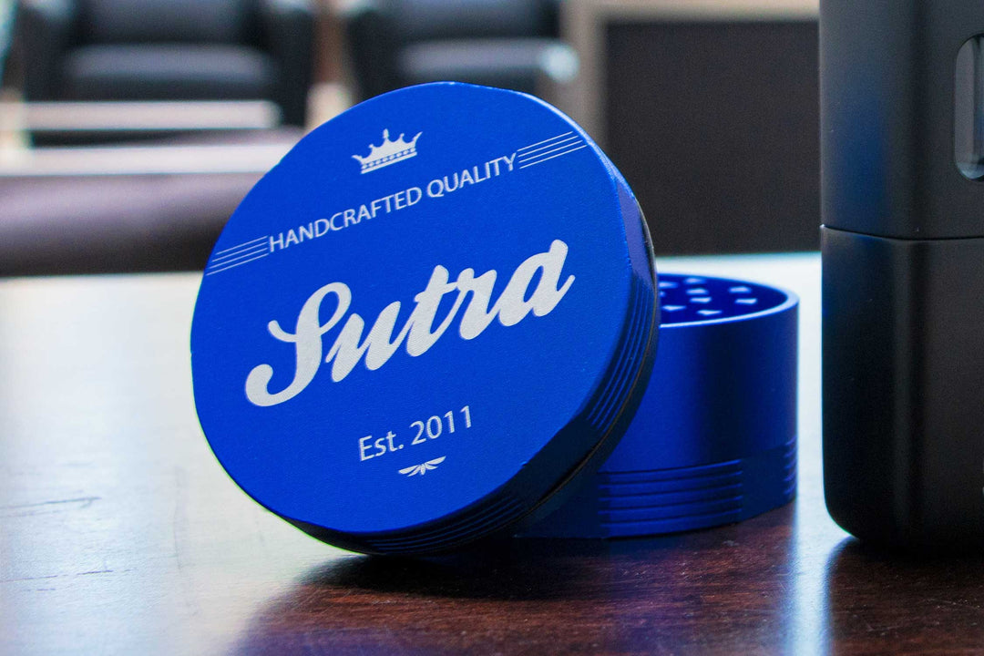 Blue Sutra Grinder on table in office